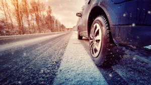 car on winter road in the morning