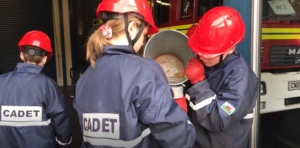 Cadets filling a bucket